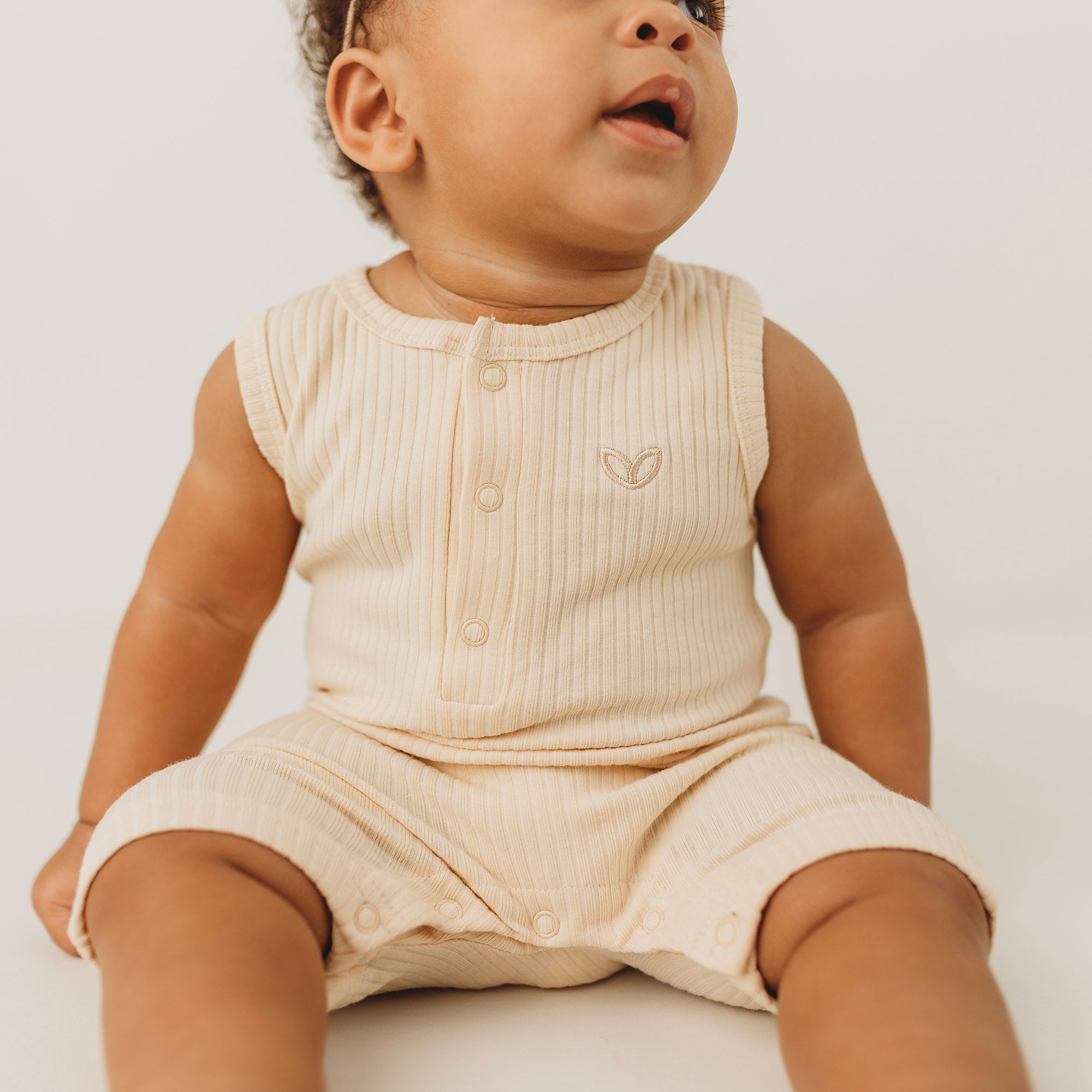 Cream baby romper hotsell